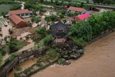 At least 30 dead as almost a year’s worth of rain lashes Beijing