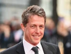 Hugh Grant says he’s ‘relieved’ he no longer plays the ‘charming lead’