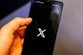 X agrees to crack down on terror content in UK