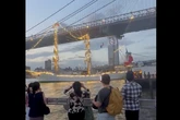 Tall ship crashes into Brooklyn Bridge with search and rescue underway