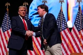 Newsmax once courted Tucker Carlson. Now they say he’s irrelevant.