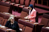 Muslim senator says male colleague told her to drink wine and dance