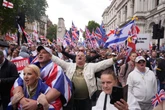 Cryptocoins, merch and Musk: How Tommy Robinson pulled off huge march