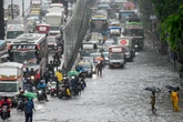 Storms and floods kill over a dozen as early rains batter South Asia