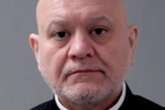 Priest accused of using teen girl's hair as floss