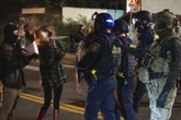 Portland braces for federal troops as protests escalate and conservative influencer is arrested