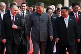A summit and parade in China may signal a geopolitical shift. They might also be political jockeying