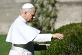Pope feeds fish as he explores the Vatican’s new eco-friendly farm