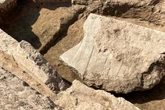 Rare stone carving found depicting Assyrian king surrounded by gods