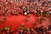 Spain’s Buñol marks 80 years of tomato-fuelled chaos at La Tomatina