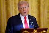 Trump hosts ballroom fundraiser as federal workers go unpaid