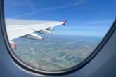 Couple escape on business class flight after $2m fraud