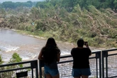 Risk of further floods in Texas during desperate search for missing as death toll tops 80