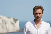 Chris Philp has knife pulled on him during trip to French migrant camp