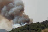 Spanish wildfires rage as tourists forced to evacuate holiday hotspot