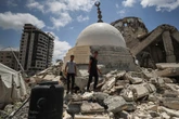 Israel wrecks last hospital in north Gaza as food aid trickles in