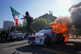 LA protesters charged after fireworks hurled at police, officials say