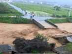 Floods and landslides kill nine in China’s south as drought hits north