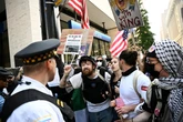 Trump anger leads thousands to march for ‘No Kings’ as cops descend