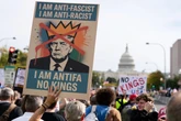 ‘No Kings’ protests pass in festival atmosphere as 7 million rally