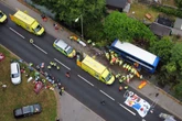 Three in hospital after bus carrying students crashes into river