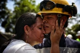 23 miners rescued after nearly two days trapped in gold mine