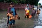 India warns Pakistan to expect flooding after opening major dams