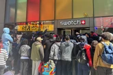Swatch shuts UK stores after queues for watch spark safety crisis