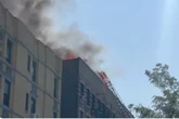 Parts of Manhattan covered in black smoke after apartment fire