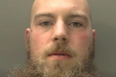 Armoured thug stabbed officer in police station attack