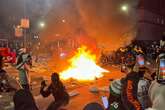 Chaos on Philadelphia streets as fans set fires and climb on cop cars