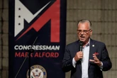 Town hall attendee rips Republican congressman for sucking up to Trump