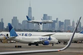 United Airlines worker sues after being forced to remove 300-lb corpse
