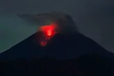 Indonesia volcano erupts again as death toll rises to 22