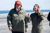 Trump promises pay raises as he celebrates Navy during shutdown