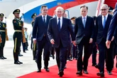 Putin given red carpet treatment as he discusses Trump talks with Xi
