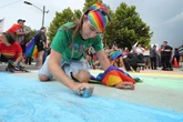 Advocates color in rainbow crosswalk removed on Trump’s order