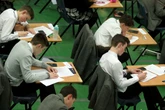 Why are boys under performing at GCSE level?