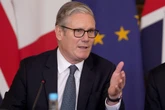 Watch live: UK and Germany sign treaty on migrant smuggling crackdown