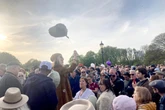 Madness star Suggs sings at emotional vigil for stabbed student