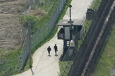 South Korea fires warning shots after North Korean troops cross border