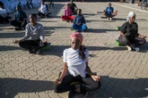 Yoga in a Zimbabwe tavern is the latest mental health outreach in a struggling country