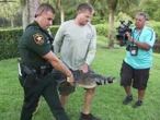 Woman mauled by 7ft alligator as she saved her dog from its jaws