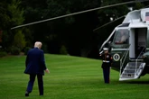 Man who pointed laser at Marine One with Trump on board charged