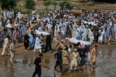 Hundreds killed in Pakistan as flash floods sweep through homes