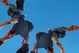 California student holds up ‘rapists don’t belong @ graduation’ sign