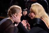 Adele and Celine Dion tear up during emotional embrace as fans go wild