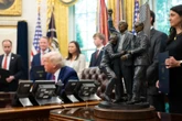 Trump displays statue of Butler assassination attempt in Oval Office