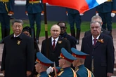 Putin stages Moscow military parade in ‘belligerent’ show of force