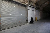 How bustling Tehran became a desert of empty streets and shops